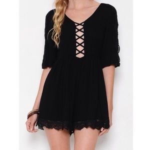 Black Romper with Plunge Top & Open Back